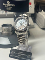 Lady Classic Date / N.A / 31 mm lunette sertie Zirconium cadran perle blanc index zircon