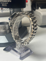 Lady Classic Date / N.A / 31 mm lunette sertie Zirconium cadran perle blanc index zircon