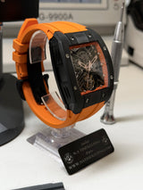 TX-01 / - TOURBILLON VOLANT - Boitier Noir Lunette CARBON Noir Cadran Orange Flare/Bracelet Orange Aiguilles Or rose