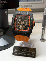 TX-01 / - TOURBILLON VOLANT - Boitier Noir Lunette CARBON Noir Cadran Orange Flare/Bracelet Orange Aiguilles Or rose