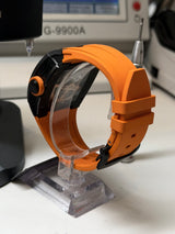 TX-01 / - TOURBILLON VOLANT - Boitier Noir Lunette CARBON Noir Cadran Orange Flare/Bracelet Orange Aiguilles Or rose
